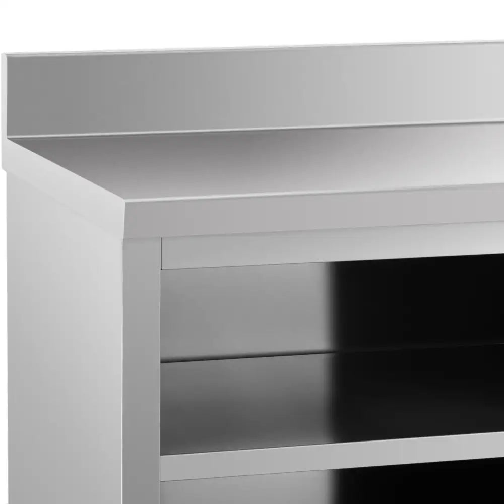 Arbeidsbord med sentral skuff, nærbilde av sølvfarget hjørne og åpne hyller i metall fra siden.