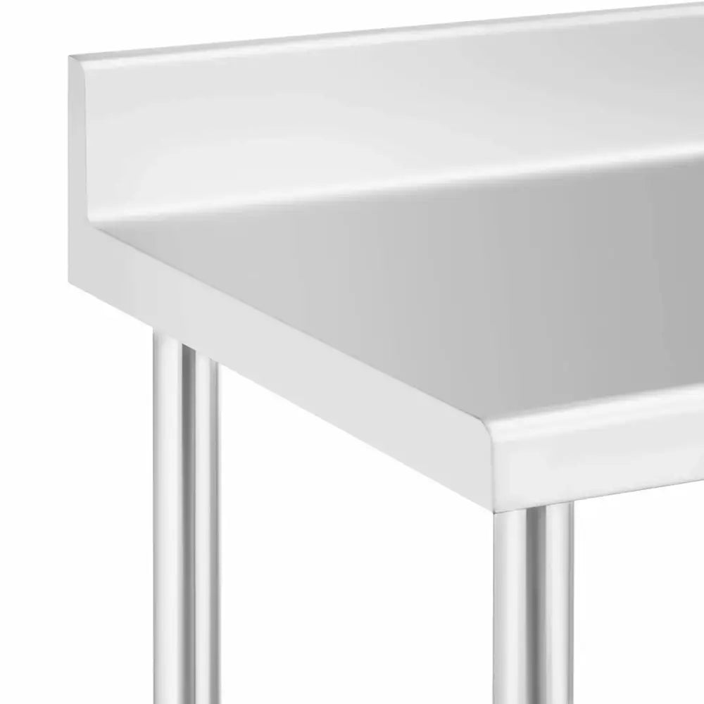 Arbeidsbord med vogn, nærbilde av rustfritt stålhjørne med opphøyd kant og rette ben i skrå vinkel.