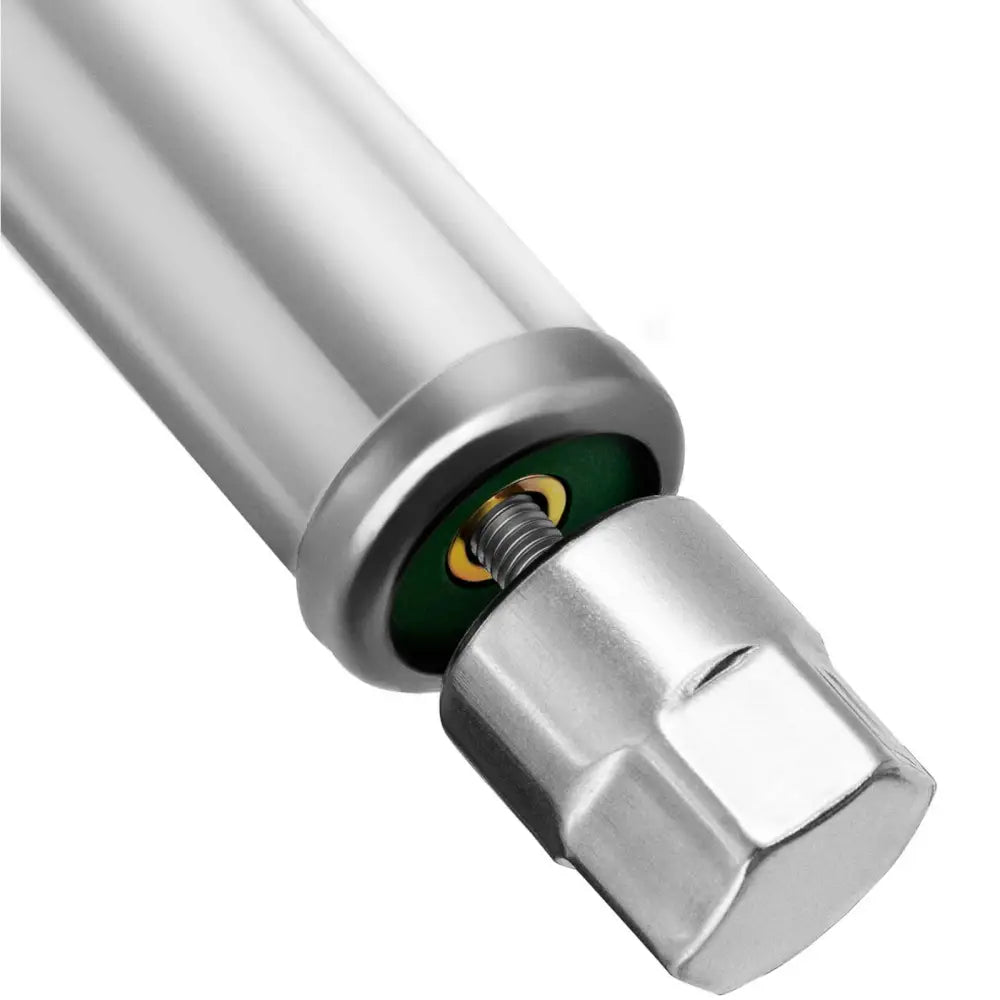 Rustfritt stål arbeidsbord, nærbilde av metallisk sylinder med gjenger og sekskantet ende for montering.