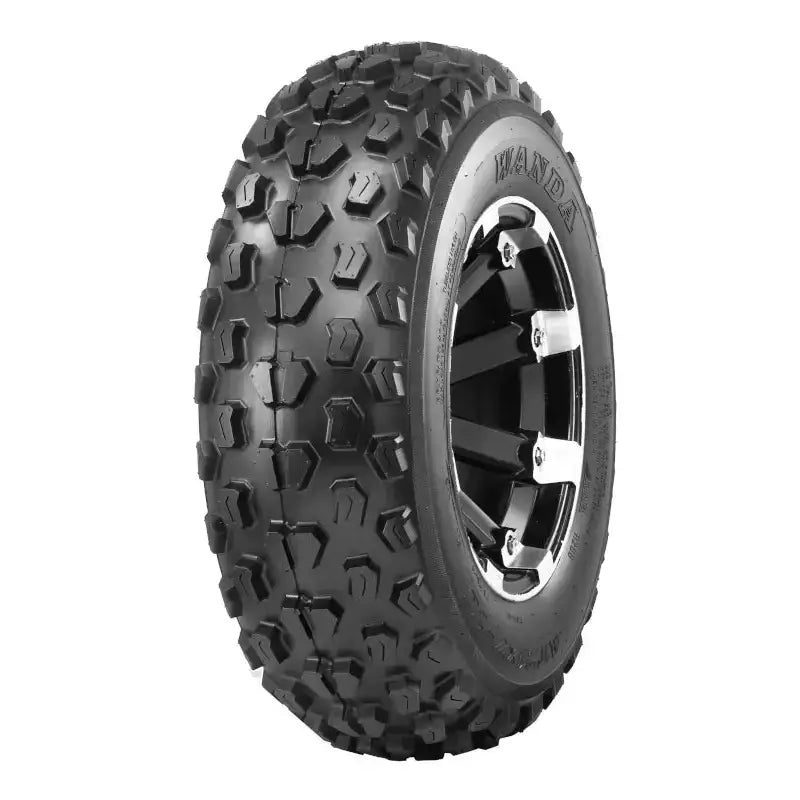 Atv Dekk 19x6-10 Journey, side- og frontvinkel som fremhever grove knotter og slitesterkt terrengmønster.