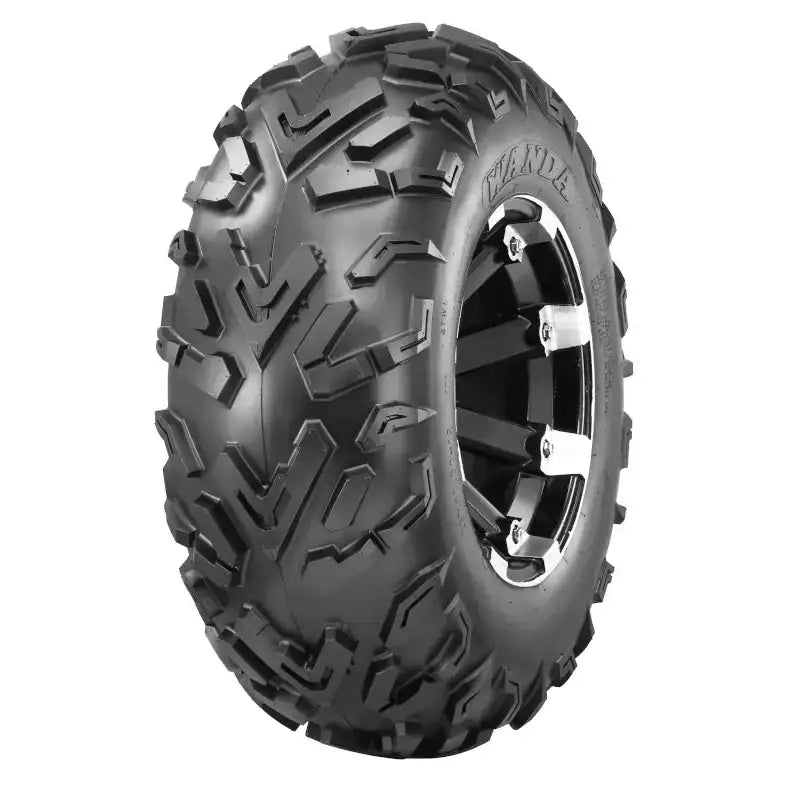 Atv Dekk 25x10-12 Journey, skrå frontvinkel som fremhever grove knaster og metallic felg mot hvit bakgrunn.