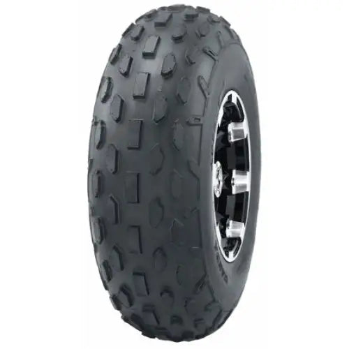 Atv Dekk 19x7-8 Journey med retningsbestemt grovmønster, skråvisning som viser sølvfarget felg og terrengprofil.