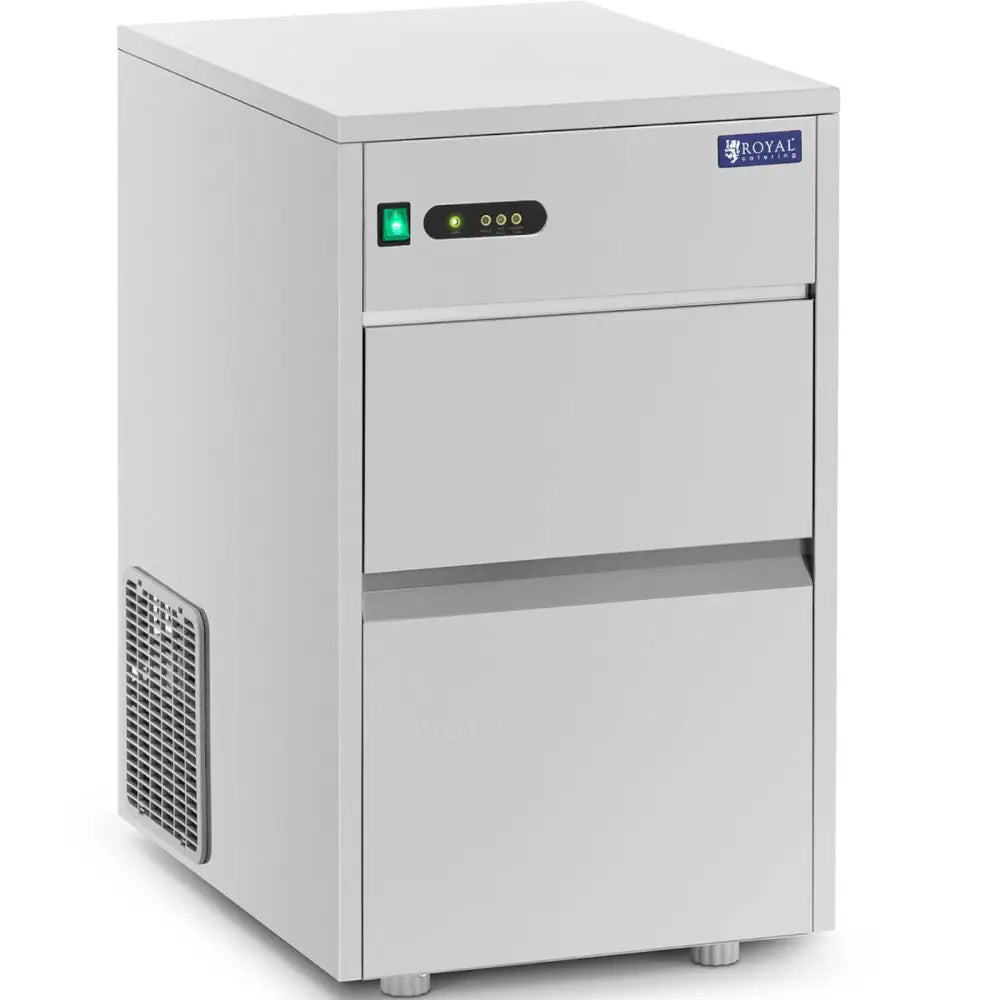 Automatisk ismaskin i rustfritt stål, skrå vinkel som viser sideventilasjon og belyst kontrollpanel foran.