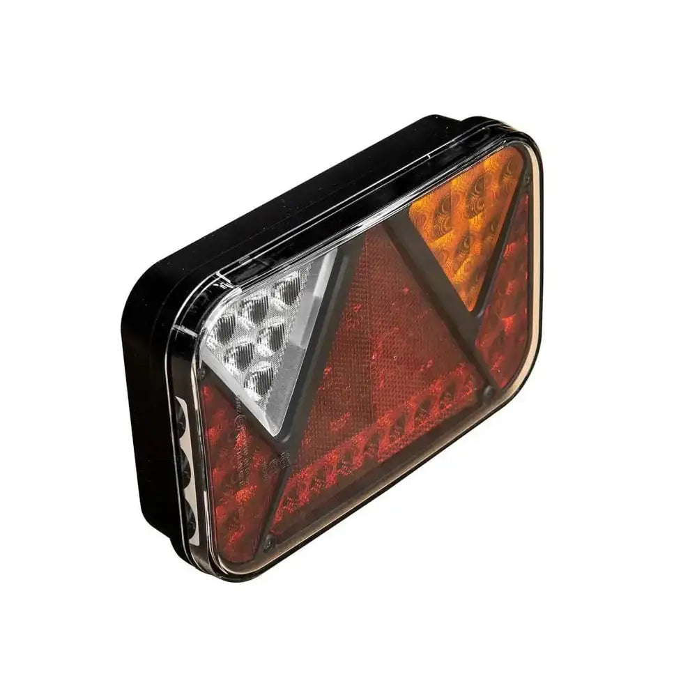 Baklys tilhenger høyre Fristom FT-270, skrå visning som fremhever røde, oransje og hvite felt under klart deksel.