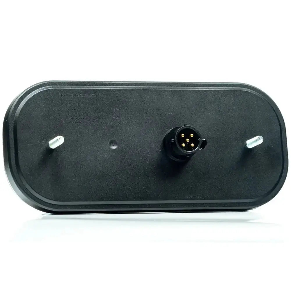 Baklys tilhenger Fristom FT-230, bakside med synlig rund 5-polet kontakt og to sølvfargede skruer.