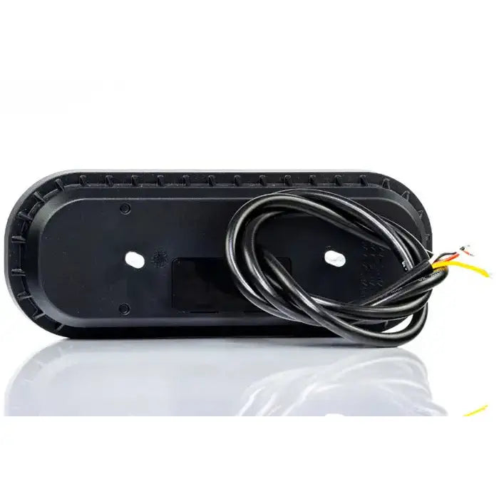 Baklys tilhenger Fristom FT-320, bakside med monteringshull og tre fargede ledninger på hvit bakgrunn.