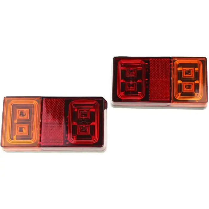 Baklys LED for tilhenger, sett ovenfra, to rektangulære lamper med røde og oransje linser og synlige LED.