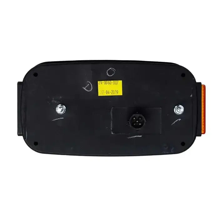 Baklys tilhenger venstre Aspöck Multipoint III, bakside med synlig kontakt, festeskruer og gul etikett.