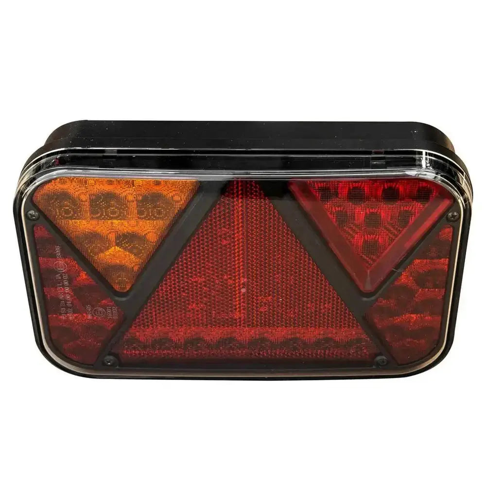 Baklys tilhenger venstre Fristom FT-270, frontbilde med røde og oransje reflekspartier og trekantrefleks.