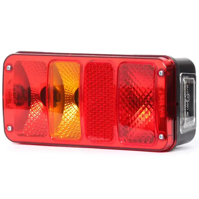 Baklys tilhenger venstre, rektangulær modell med rød og oransje linse, sett skrått fra høyre side.