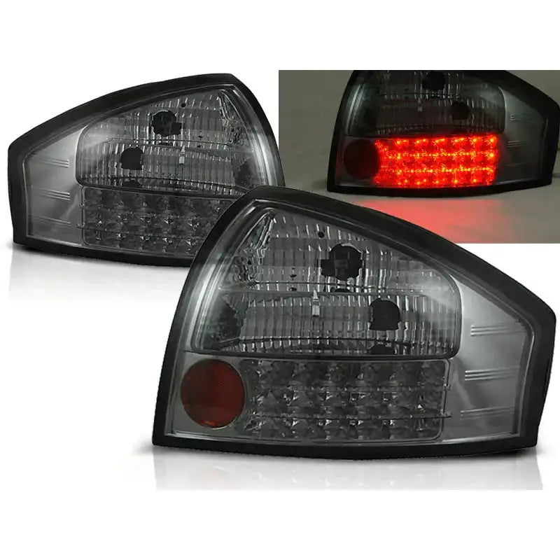 Baklykter Audi A6 05.97-05.04 Smoke LED, sett fra skrå vinkel med klart og rødt glass.