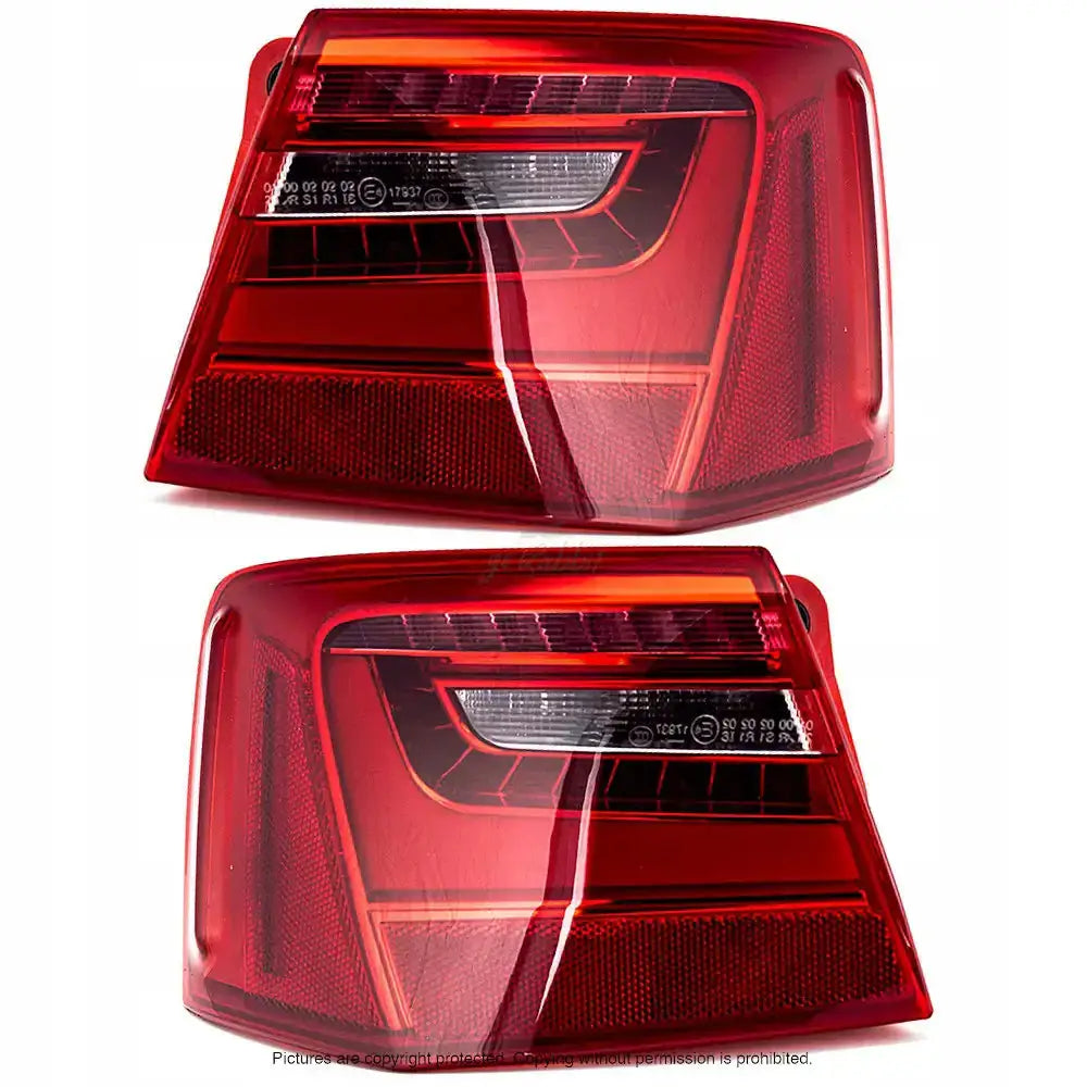 Baklykter Audi A6(C7) 10-15 W16W, to røde rektangulære baklykter vist fra skrå vinkel.