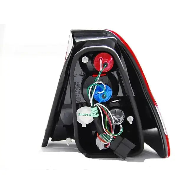 Baklykt Bmw E46 Compact Red Smoke bakside med synlige ledninger, pærer og koblingspunkter.