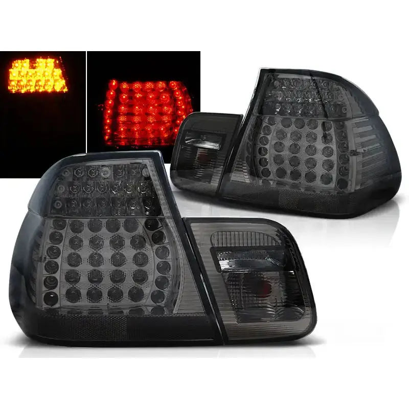 Baklykter BMW E46 09.01-03.05 sedan i smoke LED, sett fra skrå vinkel med lys i oransje og rødt.