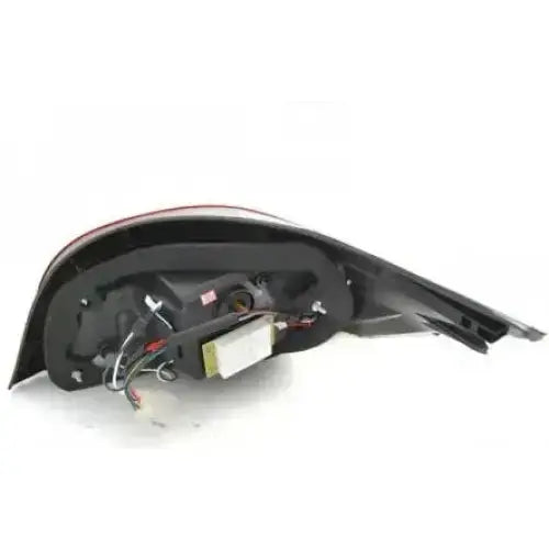 Baklykt Bmw E60 LCI 07-10 med synlige ledninger og grå detaljer, sett fra koblingssiden.