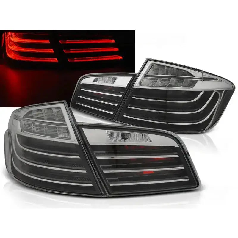 Baklykter Bmw F10 Black Chrome med LED Bar, sett skrått, viser moderne design og mørktonet glass.