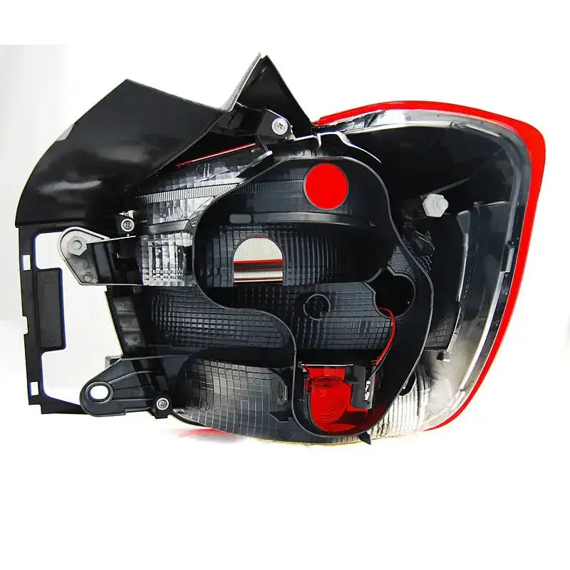 Baklys Bmw F20 F21 11-12.14 nærbilde bakside med lamper, ledninger og festepunkter mot hvit bakgrunn.