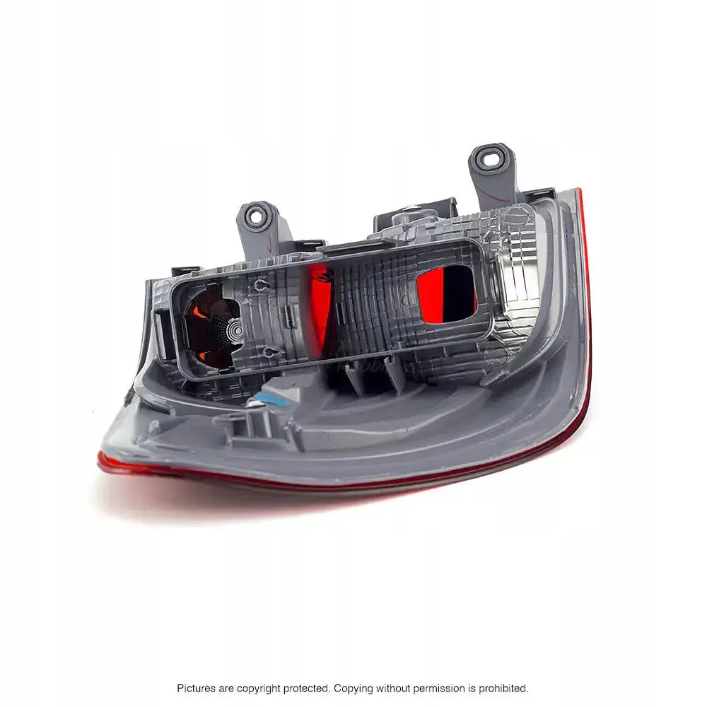 Baklamper Bmw X3 F25 10-17 bakside i grå plast med røde detaljer og synlige monteringspunkter.