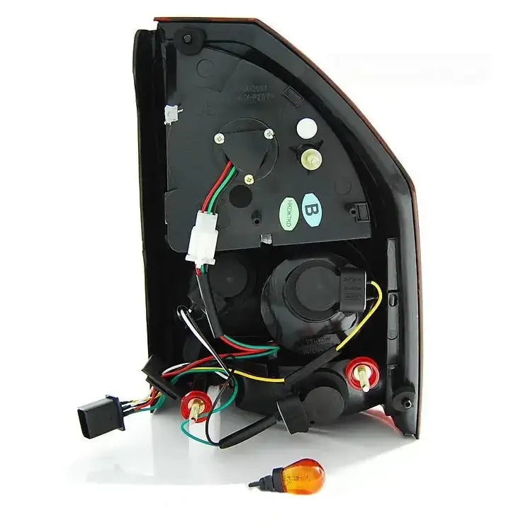 Baklys Chrysler 300C Black LED med synlige ledninger og oransje pære foran på hvit bakgrunn.