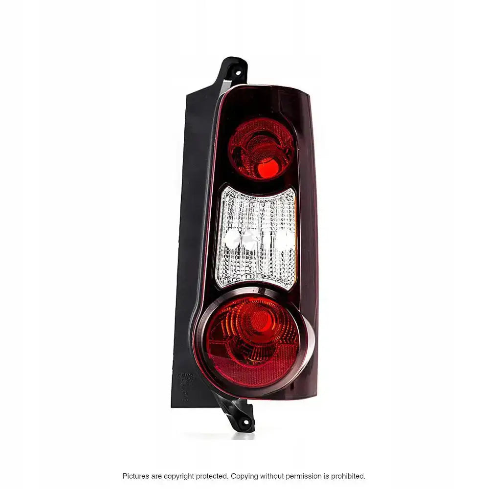 Baklys Citroen Berlingo 08-12 med to runde røde seksjoner og klar reflektor, sett forfra.