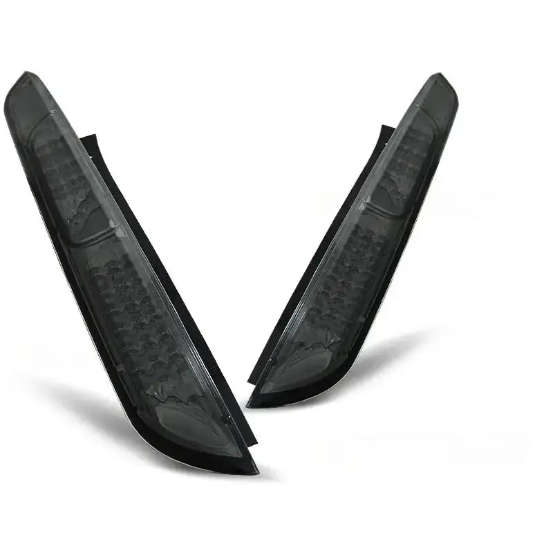 Baklykt Ford Focus Mk2 09.04-08 HB i smoke LED, avlang med synlig innvendig mønster.