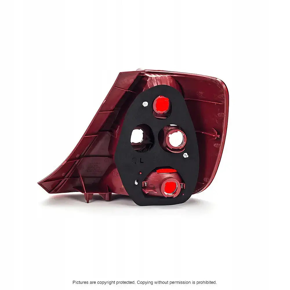 Baklykter Honda Civic 7 01-03 sett fra innsiden med synlige pærefester på hvit bakgrunn.