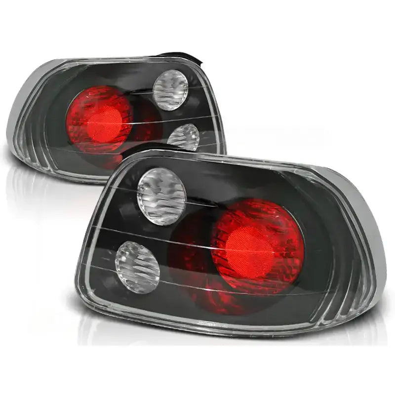 Baklykter Honda CRX Del Sol 92-97 med svarte detaljer og runde røde og hvite elementer, skrå vinkel.