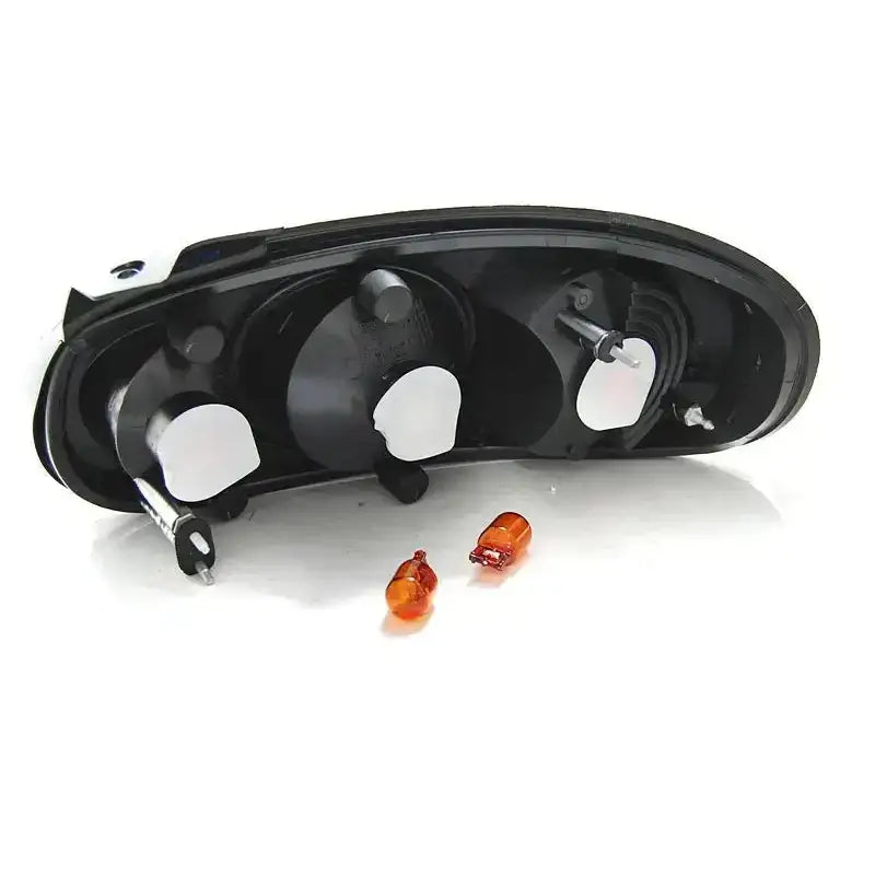 Baklykt Mazda MX5 NB 98-05 chrome sett bakfra med synlige pærefester og to oransje lyspærer.