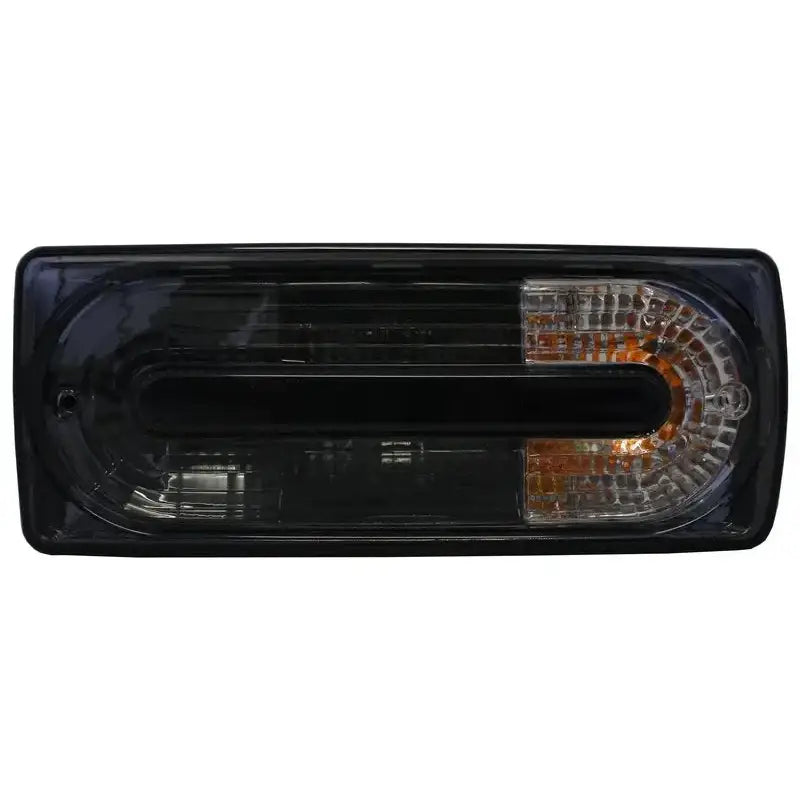 Baklys Smoked svart billykt til Mercedes G-Klasse W463, sett forfra med oransje detalj.