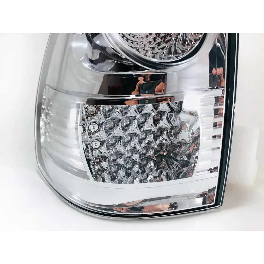 Baklys Toyota Land Cruiser 120 Chrome Led med klart deksel og detaljert reflektormønster fra siden.