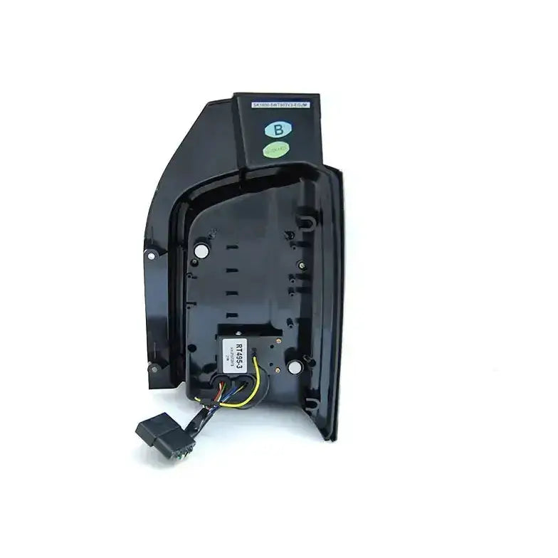 Baklykt Volkswagen T5 04.03-09 Black Smoke Full Led sett bakfra med ledninger og synlige etiketter.