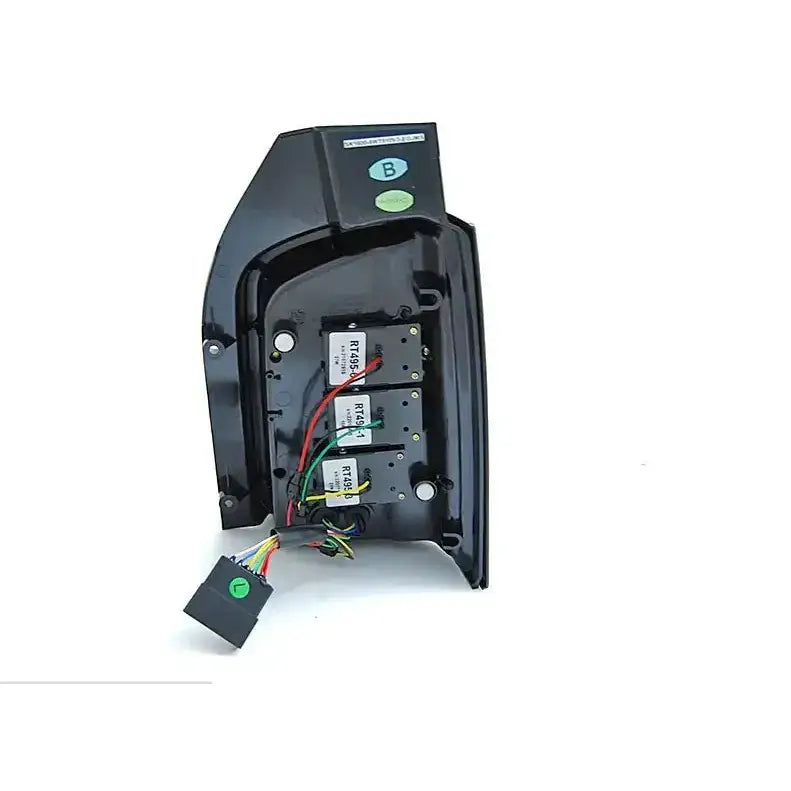 Baklykt Volkswagen T5 10-15 Red Smoke Led vist fra innsiden med synlige ledninger og komponenter.