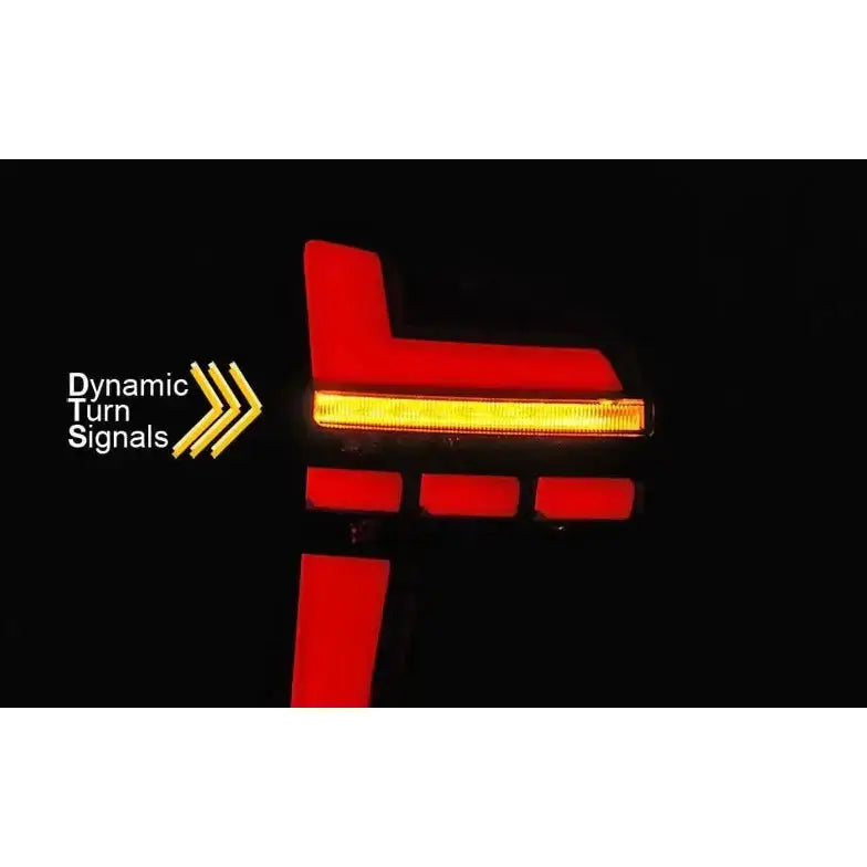 Baklamper Volkswagen T6 15-19 LED black med gule dynamiske blinklys aktivert i mørket.