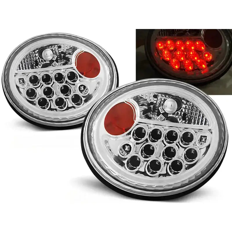 Baklykter Vw Beetle 10.98-05 Chrome Led med klart glass, svarte LED-elementer og rød seksjon.