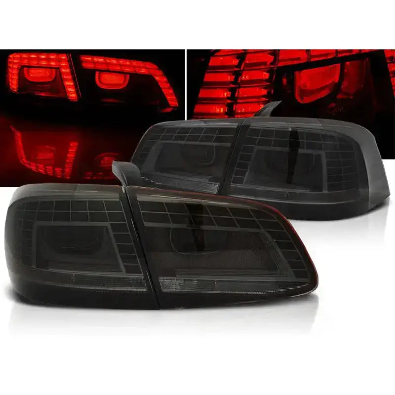 Baklykter Vw Passat B7 Sedan LED, sotet plast, tent rødt lys sett fra skrå vinkel i mørket.