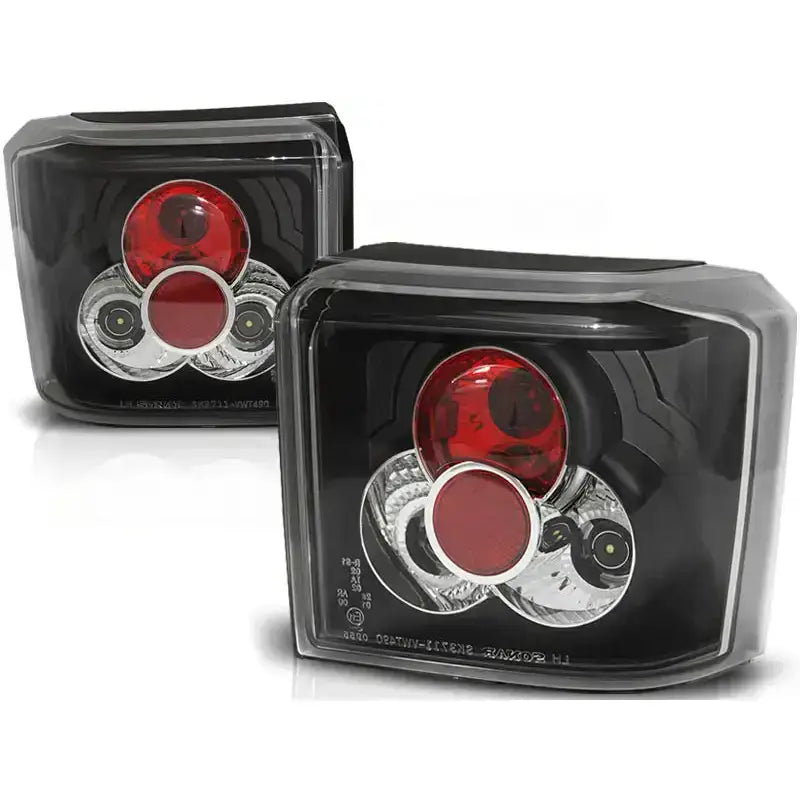 Baklykter Vw T4 90-03.03 Black med klare linser, røde og sølv detaljer, sett skrått forfra.