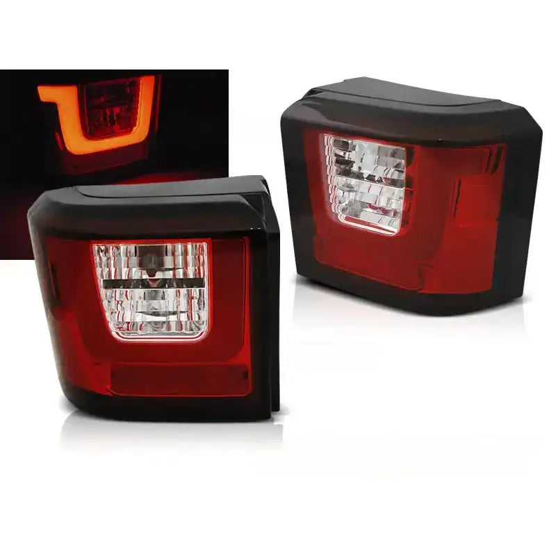 Baklykter Vw T4 90-03.03 med rød og sort ramme, LED-lys tent, vist fra skrå vinkel.