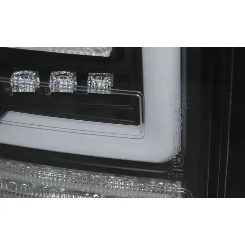 Baklykter Vw T5 10-15 Black Full Led med sorte detaljer og tre firkantede LED-elementer.