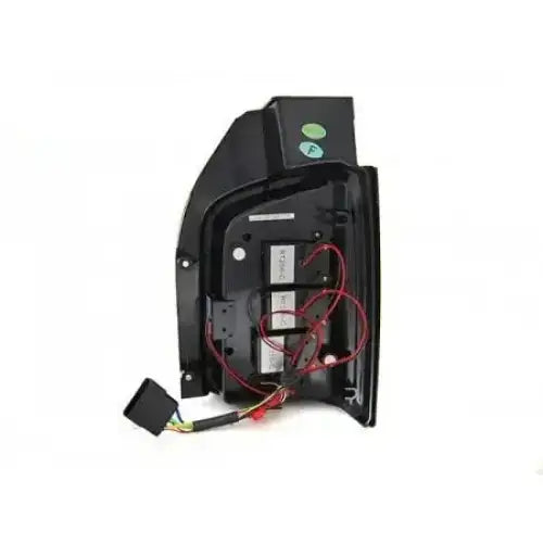 Baklamper Vw T6 15-19 TR LED Bar Smoke, bakside med synlige ledninger, koblinger og grønne etiketter.