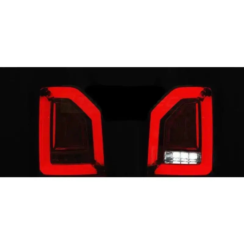 Baklys Vw T6 2015 Black SEQ LED Bar OEM BULB sett skrått bakfra, høyre med hvite LED-lys nederst.