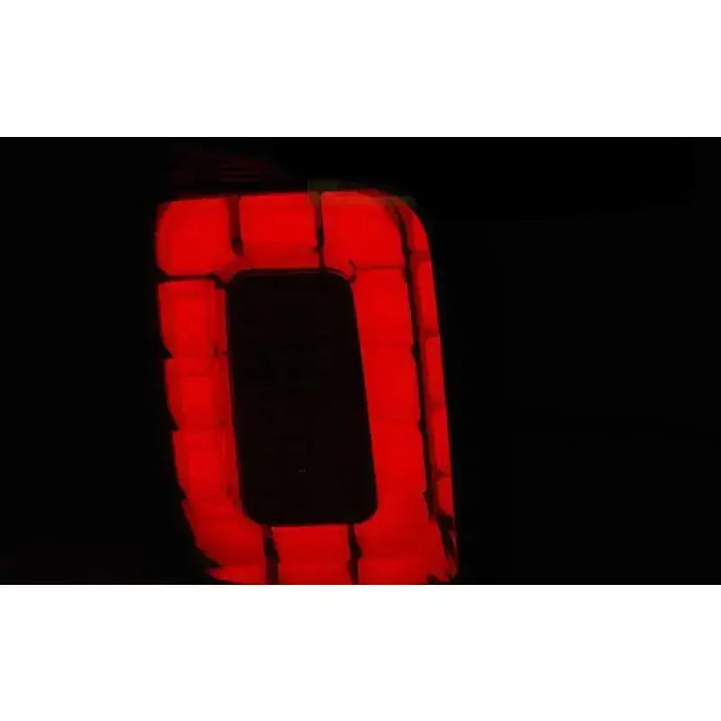 Baklys Vw T6 Transporter Red Smoke LED Bar med markant rød lysramme mot svart bakgrunn.