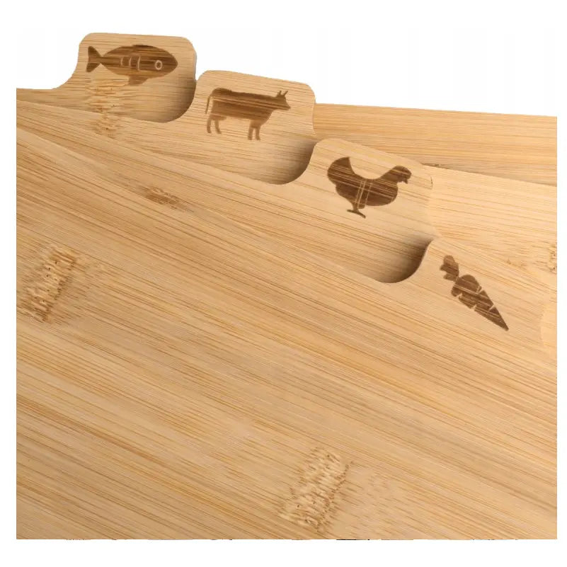 Bambuskjøkken skjærebrett sett, tre brett med dyre- og grønnsakssymboler inngravert på håndtakene.