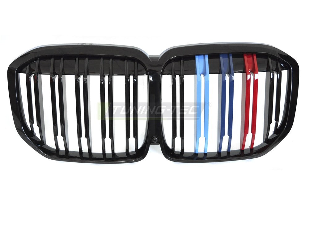 Detaljbilde av Grill X7 G07 18-22 blank sort/trefarget med lamellstruktur og BMW-nyrer.