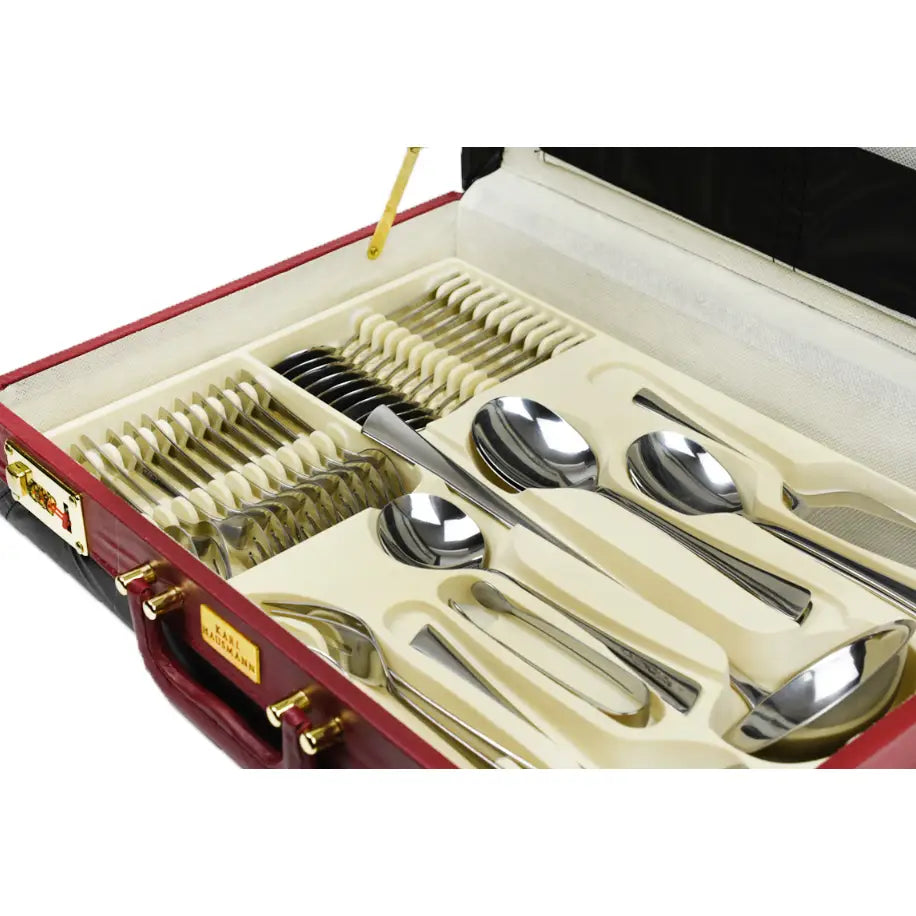Bestikksett i sølv, 72 deler for 12 personer, arrangert i kremfarget innlegg i koffert med rød kant.