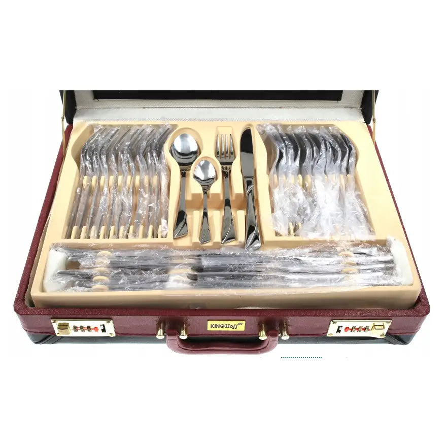 Bestikksett i koffert, 72 sølvfargede deler pent lagt i beige innlegg, hver del innpakket i plast, sett ovenfra.