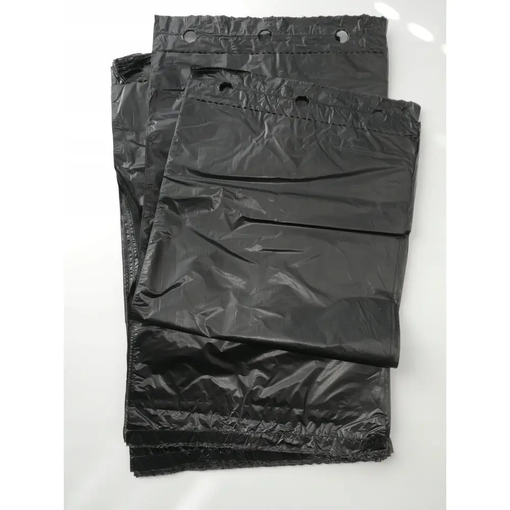 Biologisk nedbrytbare hundeposer fra 22Dogs, 2000 stk, sorte poser stablet lagvis med hull langs øvre kant.