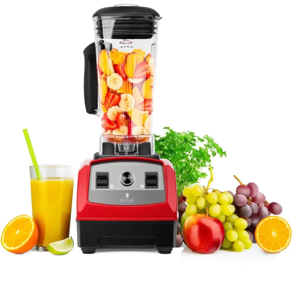 Rød og svart blender med gjennomsiktig beholder fylt med frukt, omgitt av fersk juice og friske frukter.