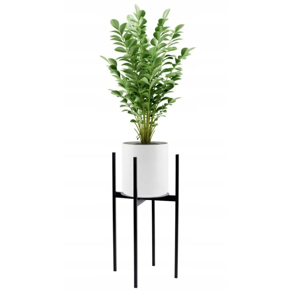 Blomsterstativ i loft-stil Torre 60 cm, sort metall med fire ben og grønn plante i hvit potte.