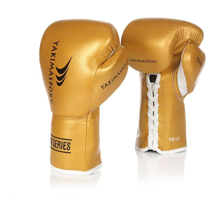 Boksehansker TIGER GOLD i gullfarget skinn, front og sidevisning med hvite snøringer og svarte logoer.