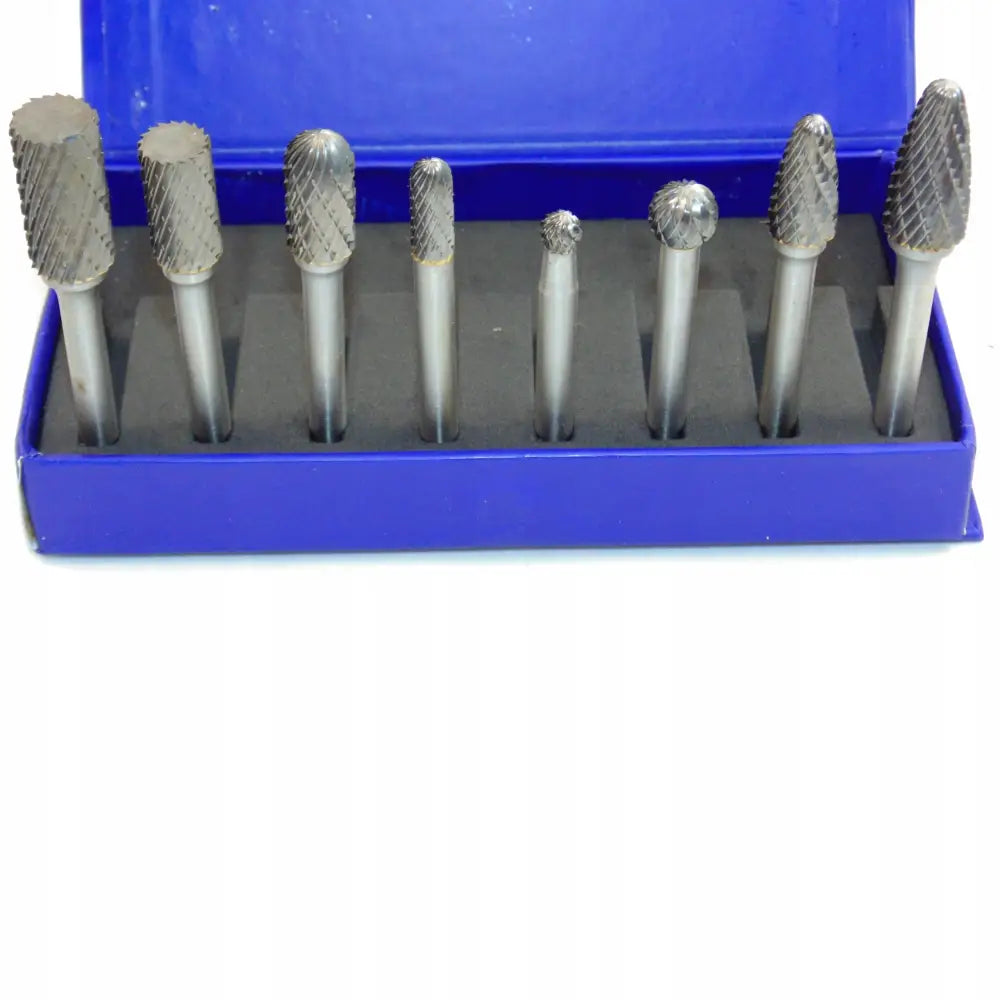 Borfrezer metallfiler med 6 mm skaft, åtte ulike former i blått etui med sort skuminnlegg.